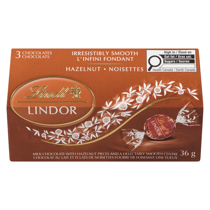 Chocolat au lait et éclats de noisettes fourré de fondant onctueux Lindor Lindt, 36 g